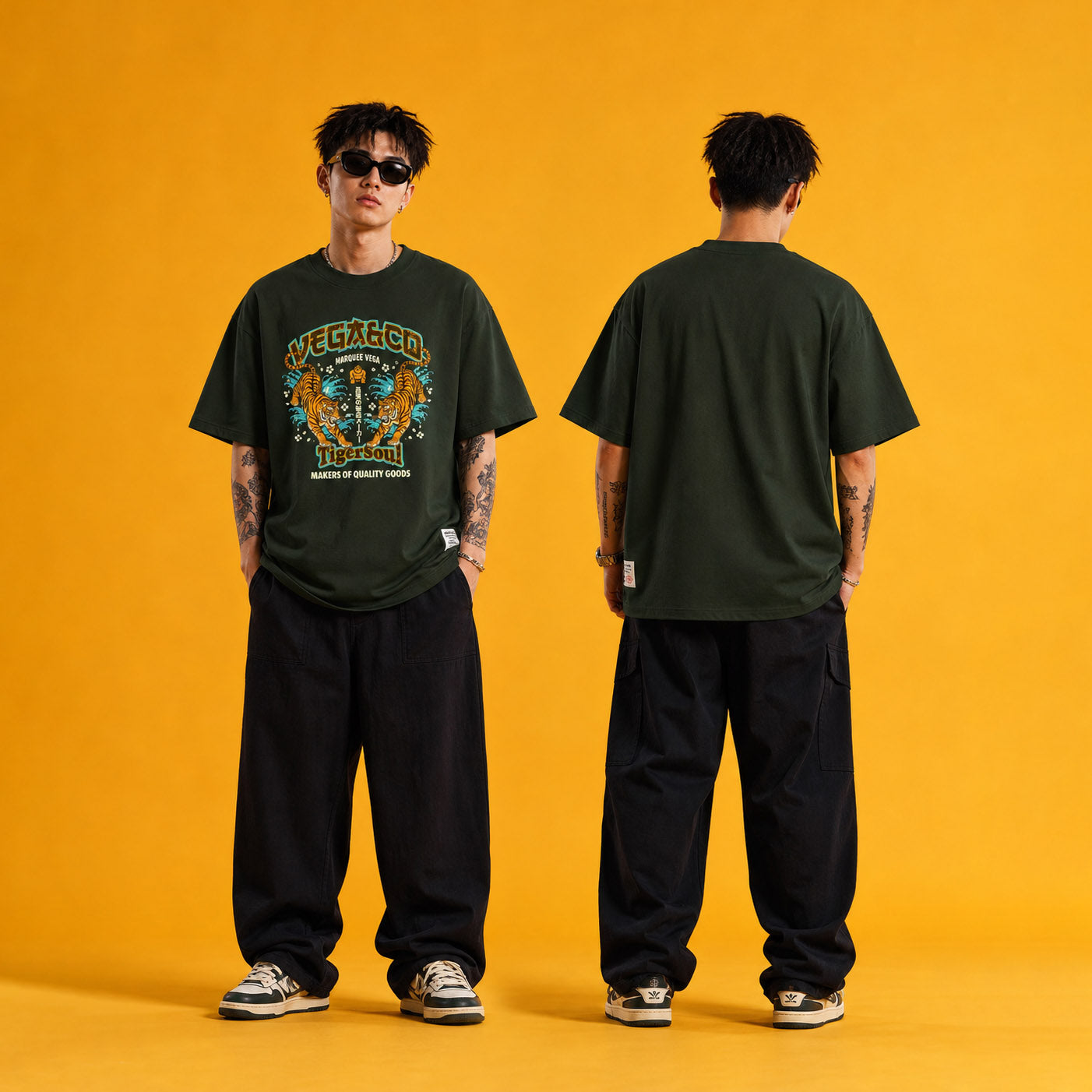Male model wearing the Vega Tiger Soul heavyweight loose fit graphic tee in Racing Green, shown front and back.