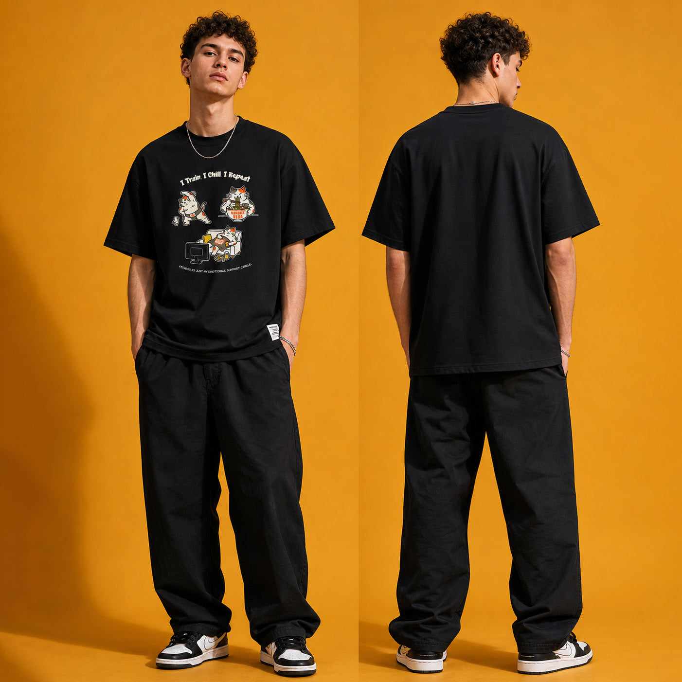 Model wearing the I Train I Chill I Repeat heavyweight loose fit graphic tee in Vintage Black, shown in styled product photography.