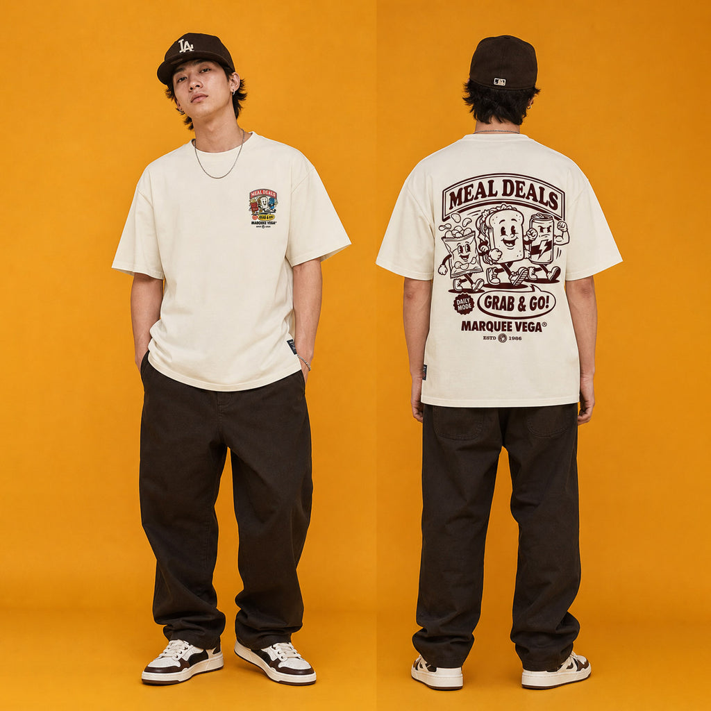 Male model wearing the Meal Deals Grab & Go heavyweight loose fit graphic tee in Off White, shown front and back.