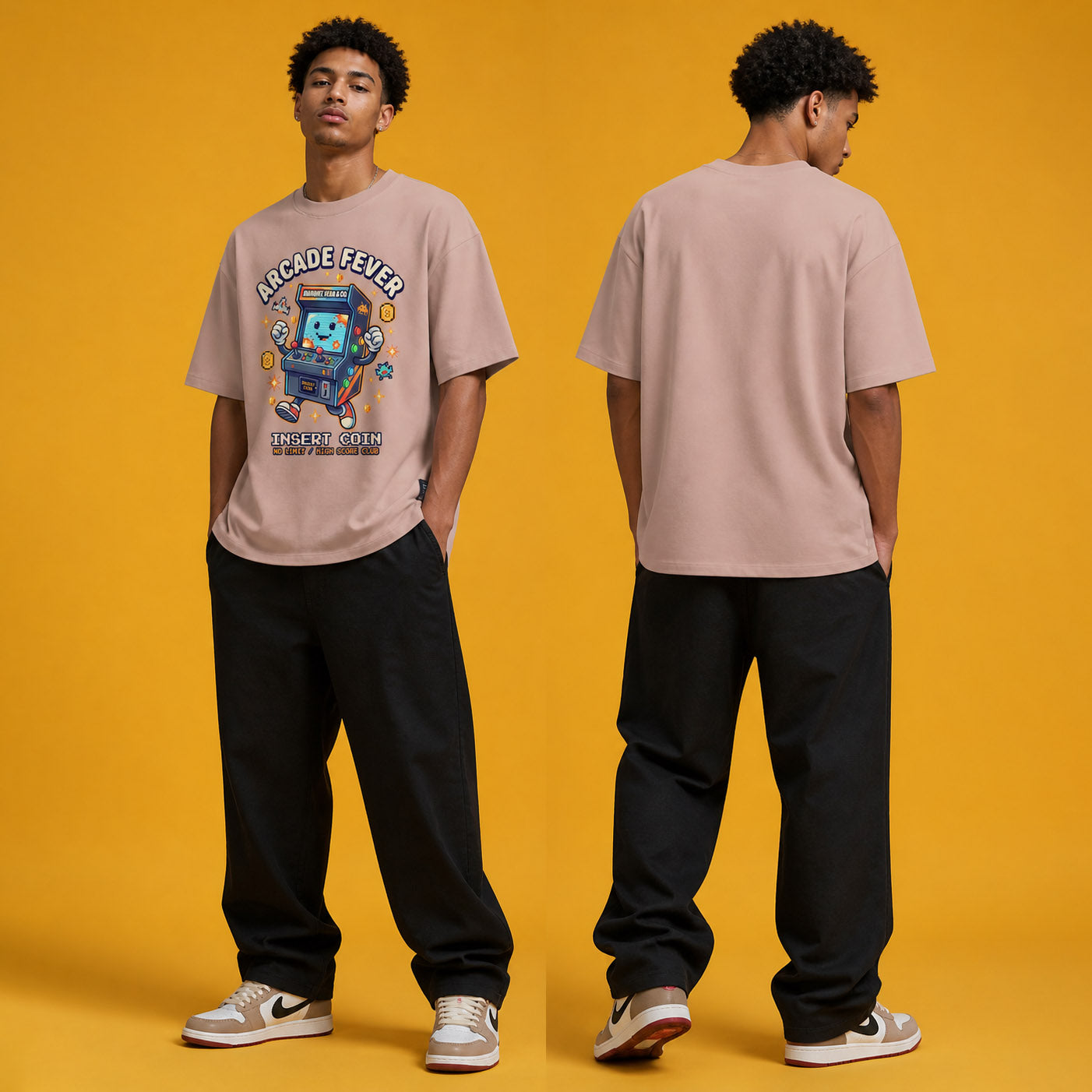 Male model wearing the Arcade Fever Insert Coin heavyweight loose fit graphic tee in Pink, shown front and back.