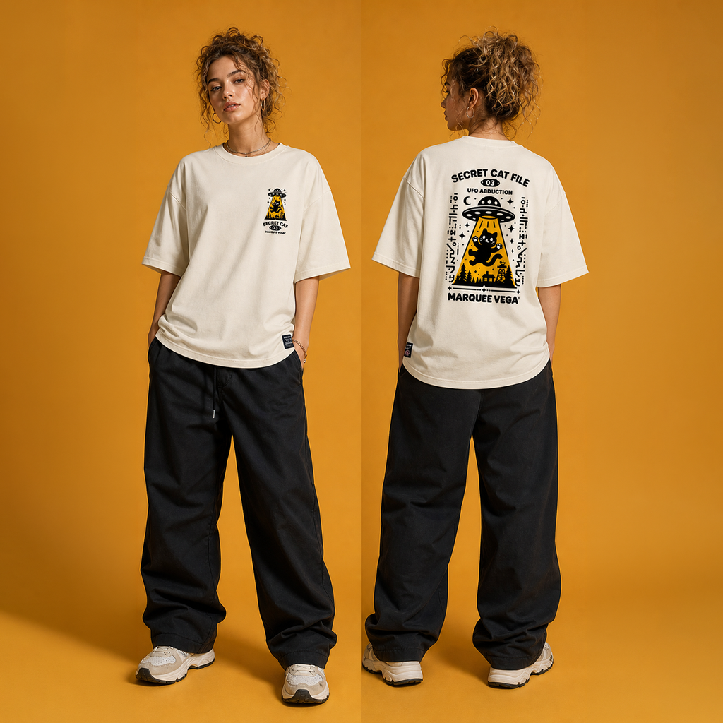 Female model styling demonstration for the Secret Cat File - UFO Abduction graphic tee by Marquee Vega.
